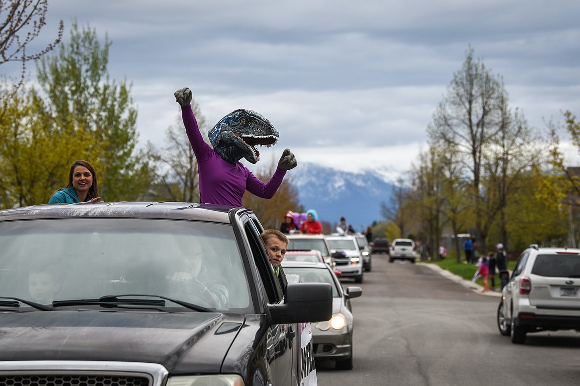 Rankin Elementary teachers and staff parade through the neighborhood along Bluestone Drive in Kalispell on Thursday, May 7, in hopes to stir up some fun before the school year ends in June.
