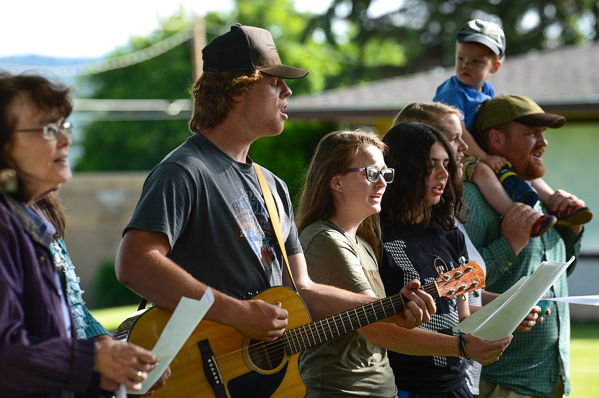 Singers and musicians from Easthaven Baptist Church perform a series of songs for seniors outside Immanuel Lutheran Communities in Kalispell on Thursday, June 11. (Casey Kreider/Daily Inter Lake)