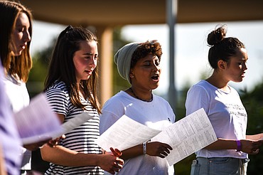 Singers from Easthaven Baptist Church perform a series of songs for seniors outside Immanuel Lutheran Communities in Kalispell on Thursday, June 11. (Casey Kreider/Daily Inter Lake)