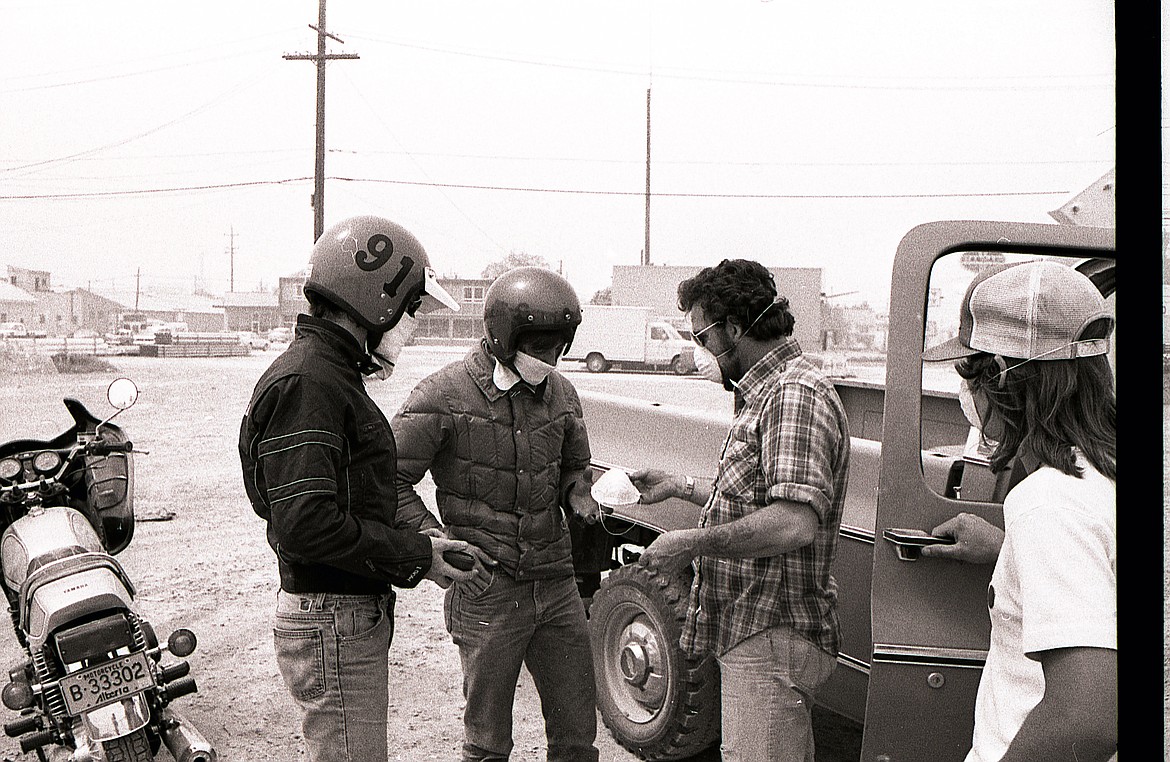 People sell masks out of a pickup in Kalispell following the eruption of Mount St. Helens. (Daily Inter Lake FILE)