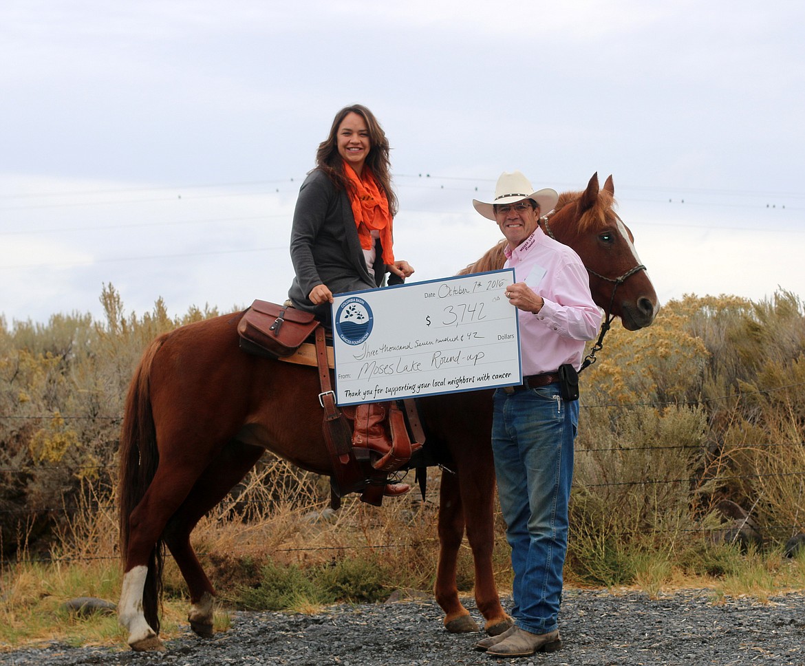 Sometimes raising funds for the Columbia Basin Cancer Foundation involves organizing events, and sometimes it involves receiving a novelty check while on horseback for a photo shoot. Mike Harris, Moses Lake Roundup’s Tough Enough to Wear Pink chairman, presented a check for $3,742 to Angel Ledesma in 2017 to help the foundation’s mission in supporting cancer patients.