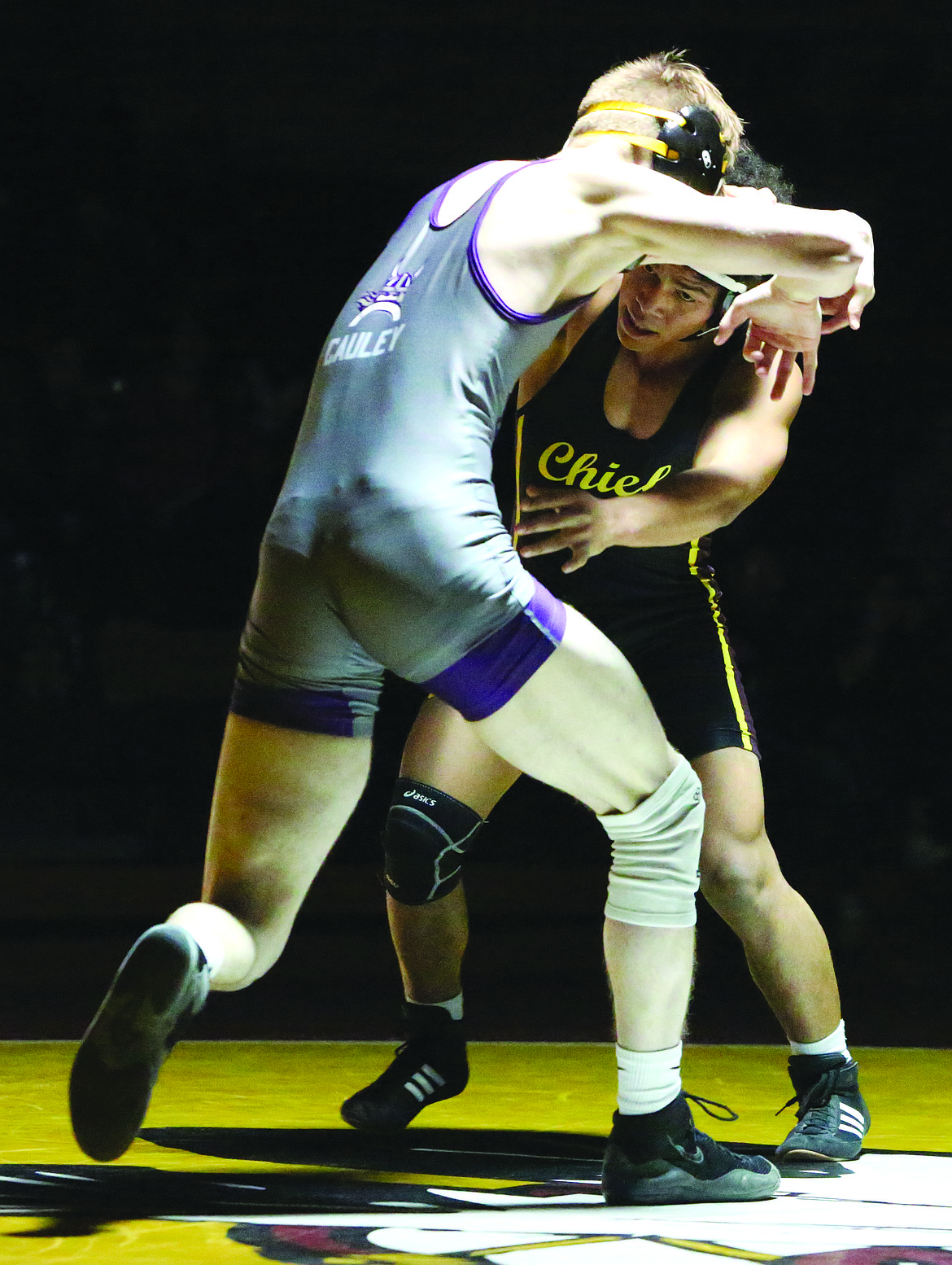 Connor Vanderweyst/Columbia Basin Herald Lerenz Thomas works against Caden Cauley of Lake Stevens.