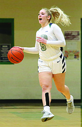 Connor Vanderweyst/Columbia Basin Herald | Big Bend point guard Kayla Luke dribbles the ball up the court against Wenatchee Valley.