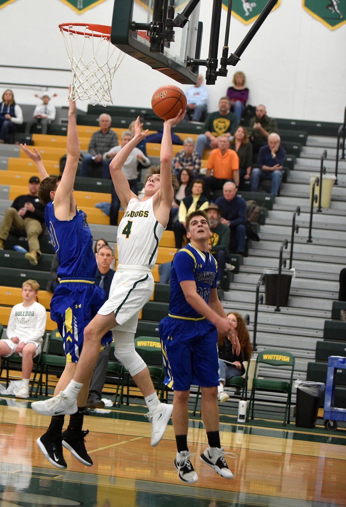 Bulldog Bodie Smith goes up for the basket in the fourth quarter against the Loggers at  the Whitefish High School gym. (Heidi Desch/Whitefish Pilot)