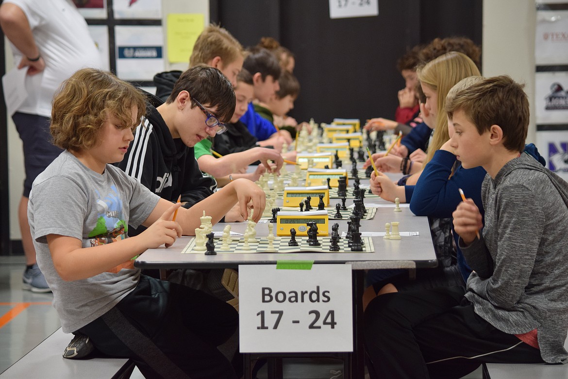 Charles H. Featherstone/Columbia Basin Herald 
 Kids from across Grant County square off for round four of the annual Waypoint Foundation chess tournament in Ephrata on Sautrday.