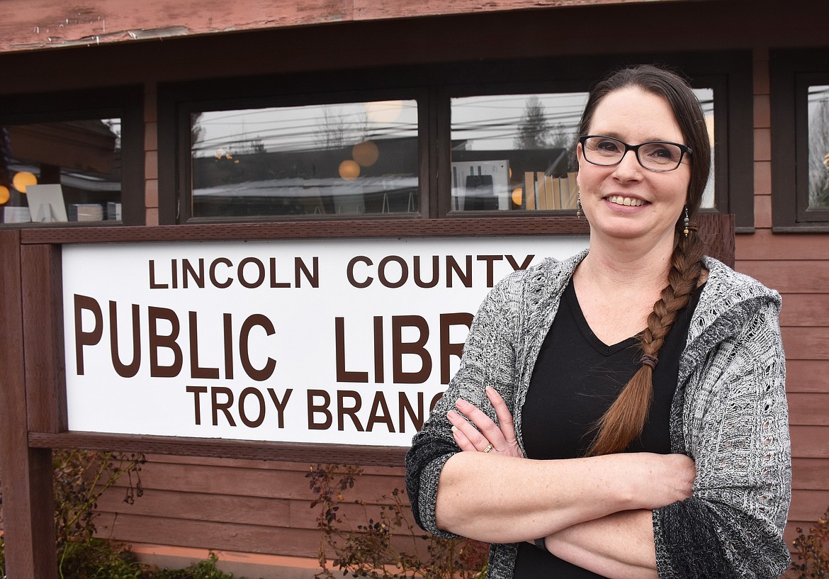 Librarian Sharee Miller stands outside the recently renovated Troy branch of the Lincoln County Library. (Duncan Adams/The Western News)