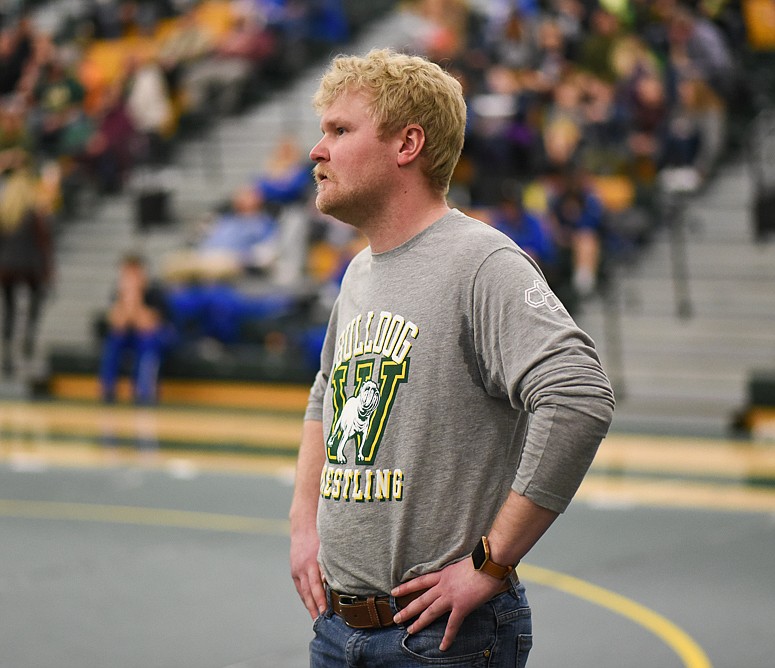 Wrestling head coach Danny Neff looks on during the Bulldogs’ home invitational last Friday. (Daniel McKay/Whitefish Pilot)