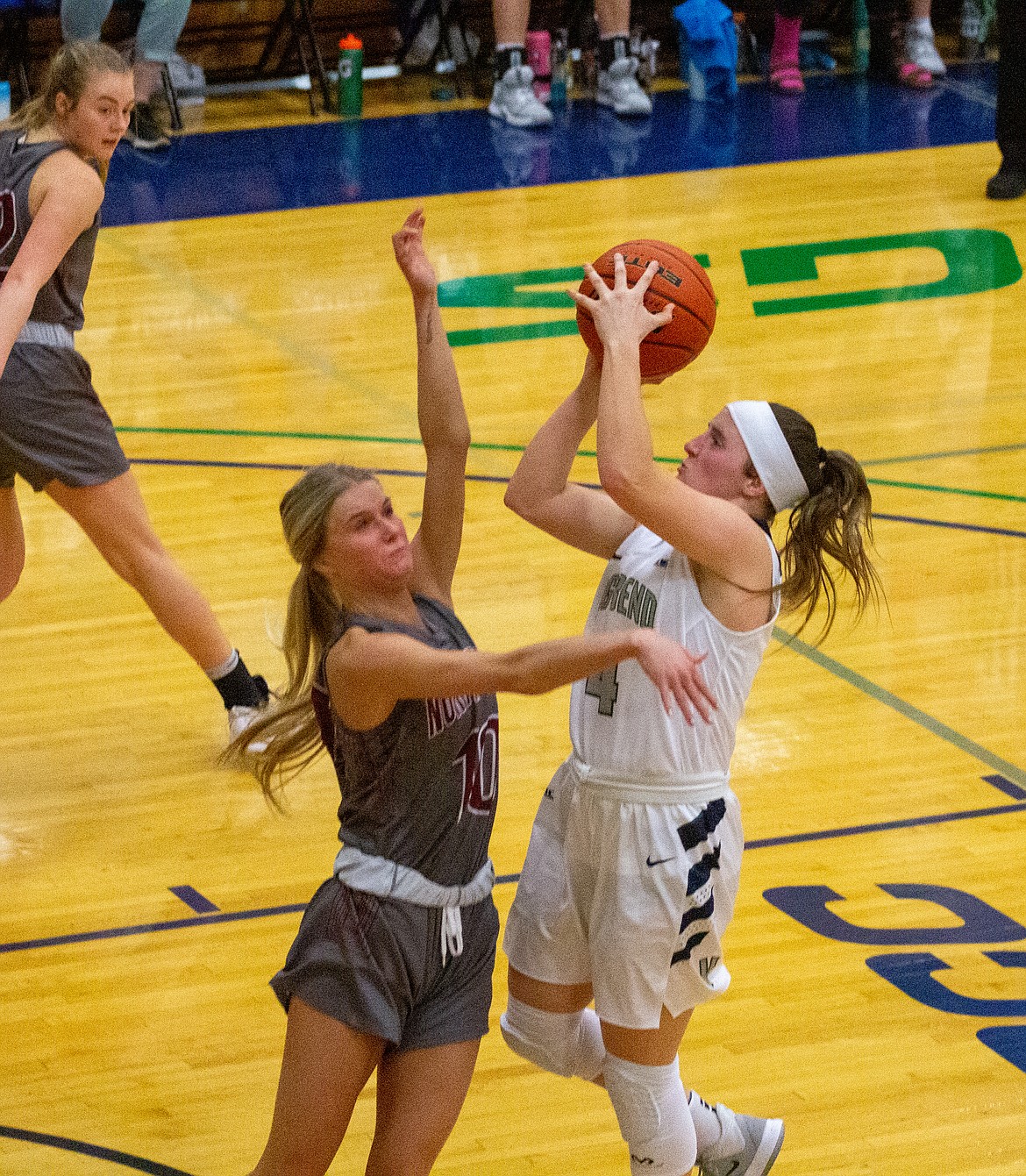 Big Bend’s Kaitlyn Callahan fires the shot over the North Idaho defender on Wednesday night.