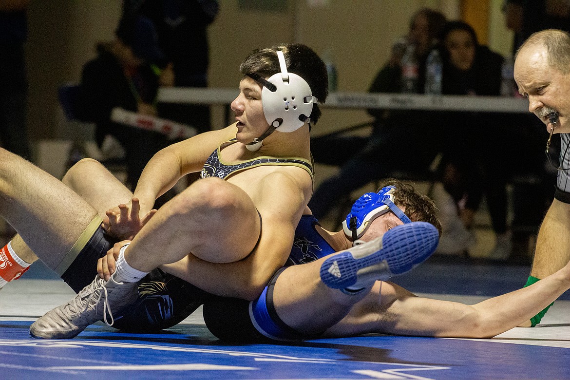 Casey McCarthy/Columbia Basin Herald Kaleb Hernandez looks for the pin against Ki-Be’s Keaton Covington on Saturday afternoon in the 145 weight class.