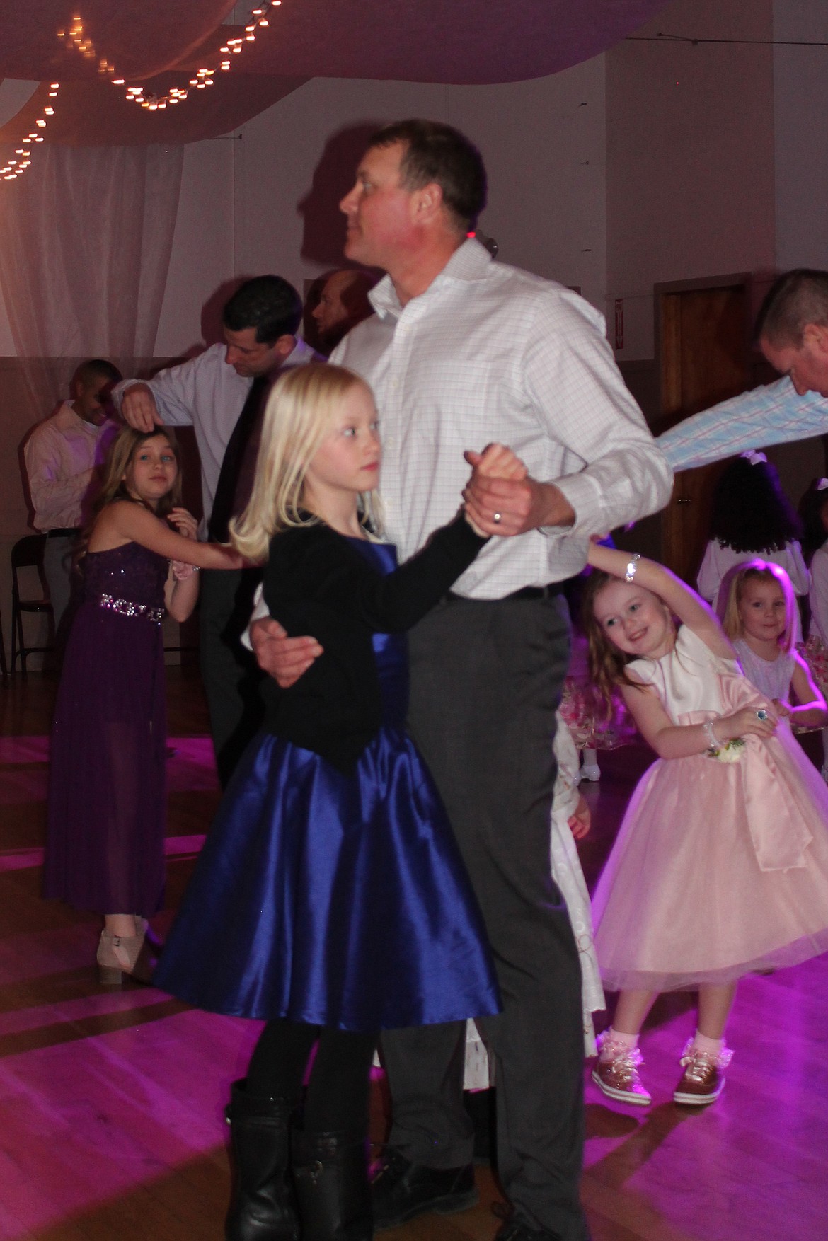 Joel Martin/Columbia Basin Herald 
 Bailee Morris, 10, and her dad Trevor take a turn around the dance floor at the Ephrata Daddy-Daughter Dance Saturday.