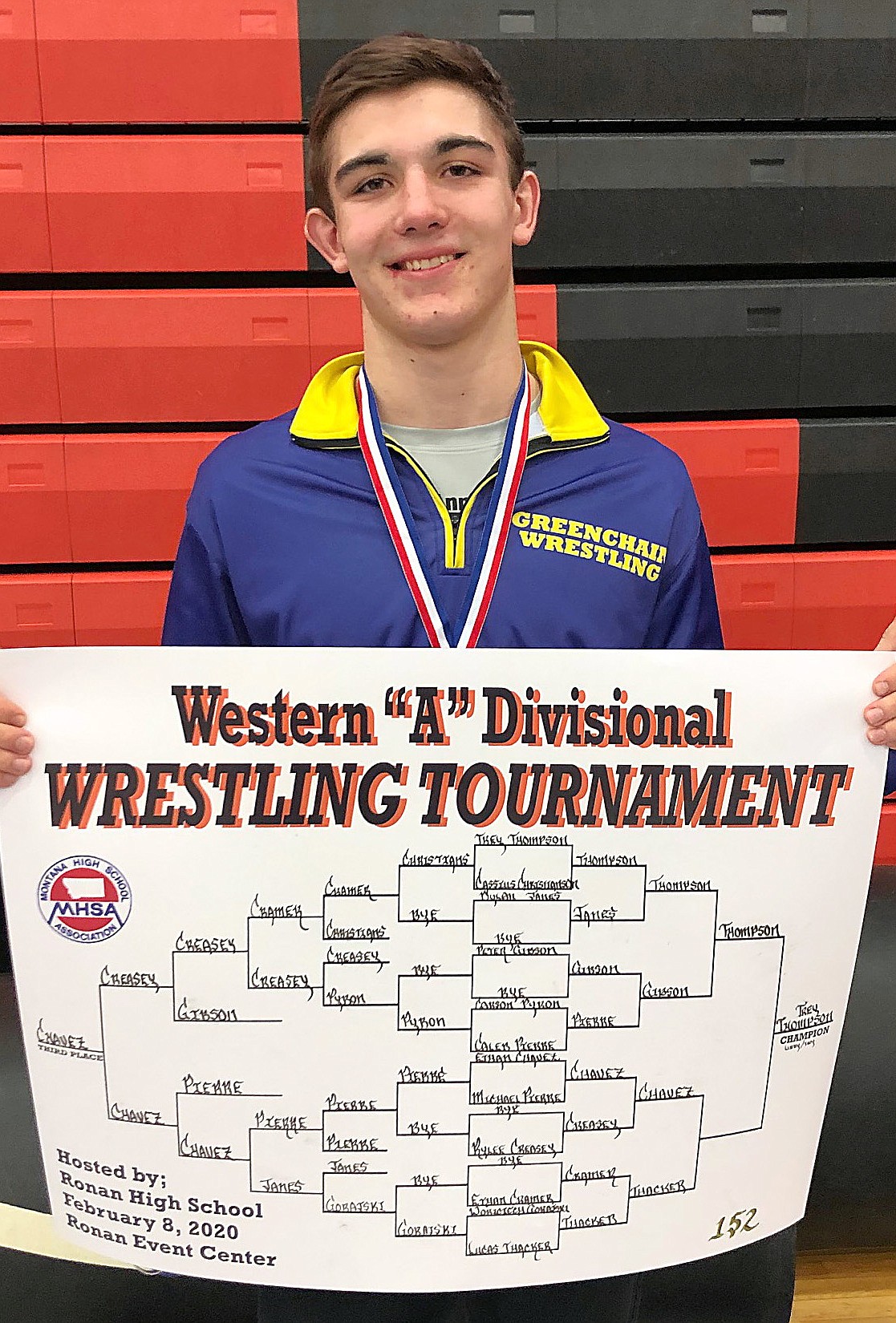 Trey Thompson took first place in the 152-pound weight class during a Feb. 8 divisional matchup in Ronan, making him one of eight members of the Greenchain to head to the state tournament. (Courtesy photo)