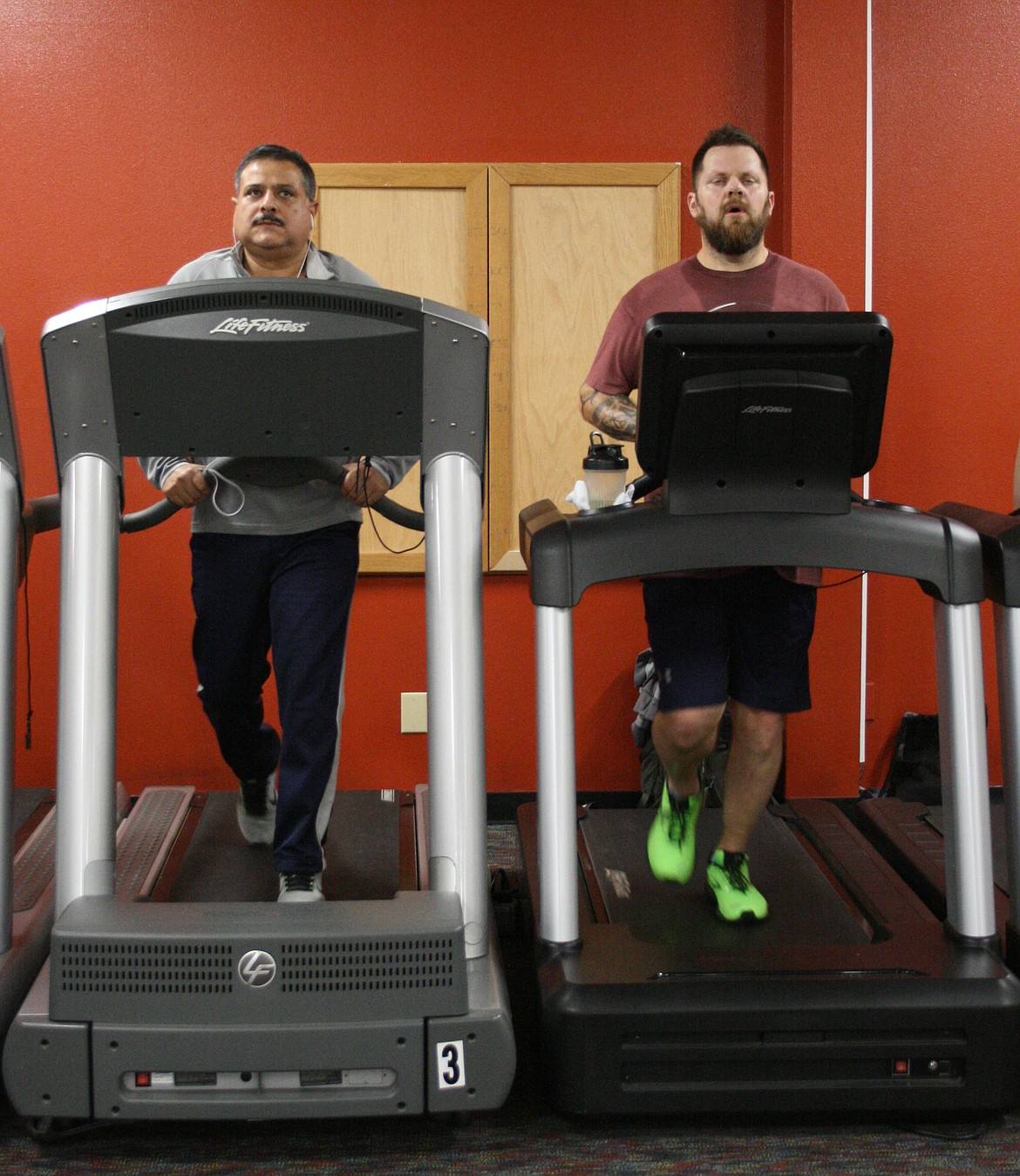 Runners use the treadmill at the South Campus Athletic Center. Exercise, and in fact any kind of movement, has benefits, and there are ways to get moving and avoid injury.
