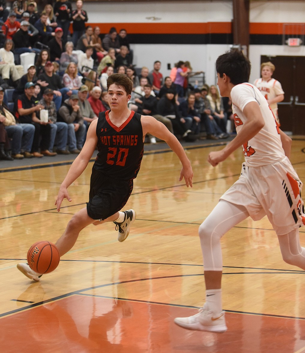 Hot Springs senior Brandon Knudsen heads to the basket against Plains in a Feb. 6 game. Knudsen led all scorers with 26 points, but Plains won the game. (Scott Shindledecker/Valley Press)