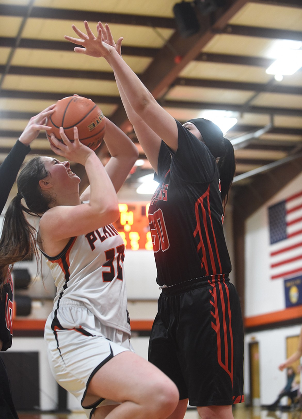 Plains senior Kylee Altmiller meets resistance from Hot Springs McKennzie Cannon during their game Feb. 6. Altmiller scored 15 while Cannon tallied 19 to help her team beat the Trotters, 69-50. (Scott Shindledecker/Valley Press)