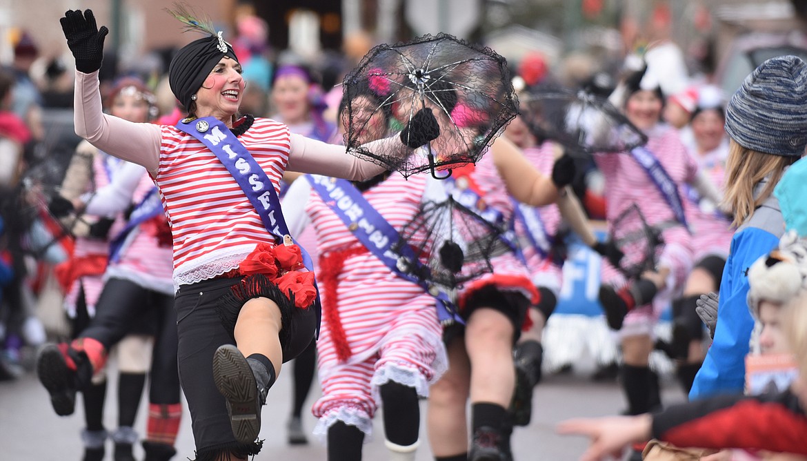 The Working Women of Whitefish are always a crowd favorite during the Whitefish Winter Carnival Grand Parade. (Heidi Desch/Whitefish Pilot)