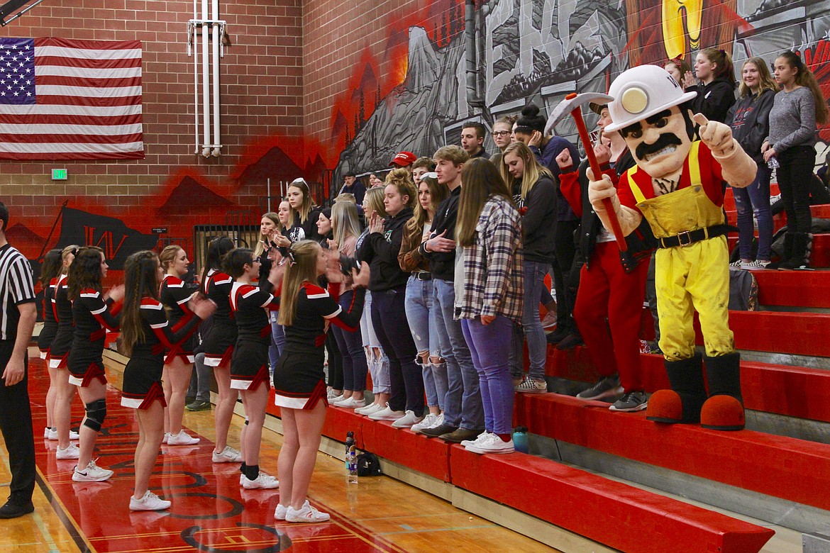 Marty joins in with the Wallace student section during a cheer.