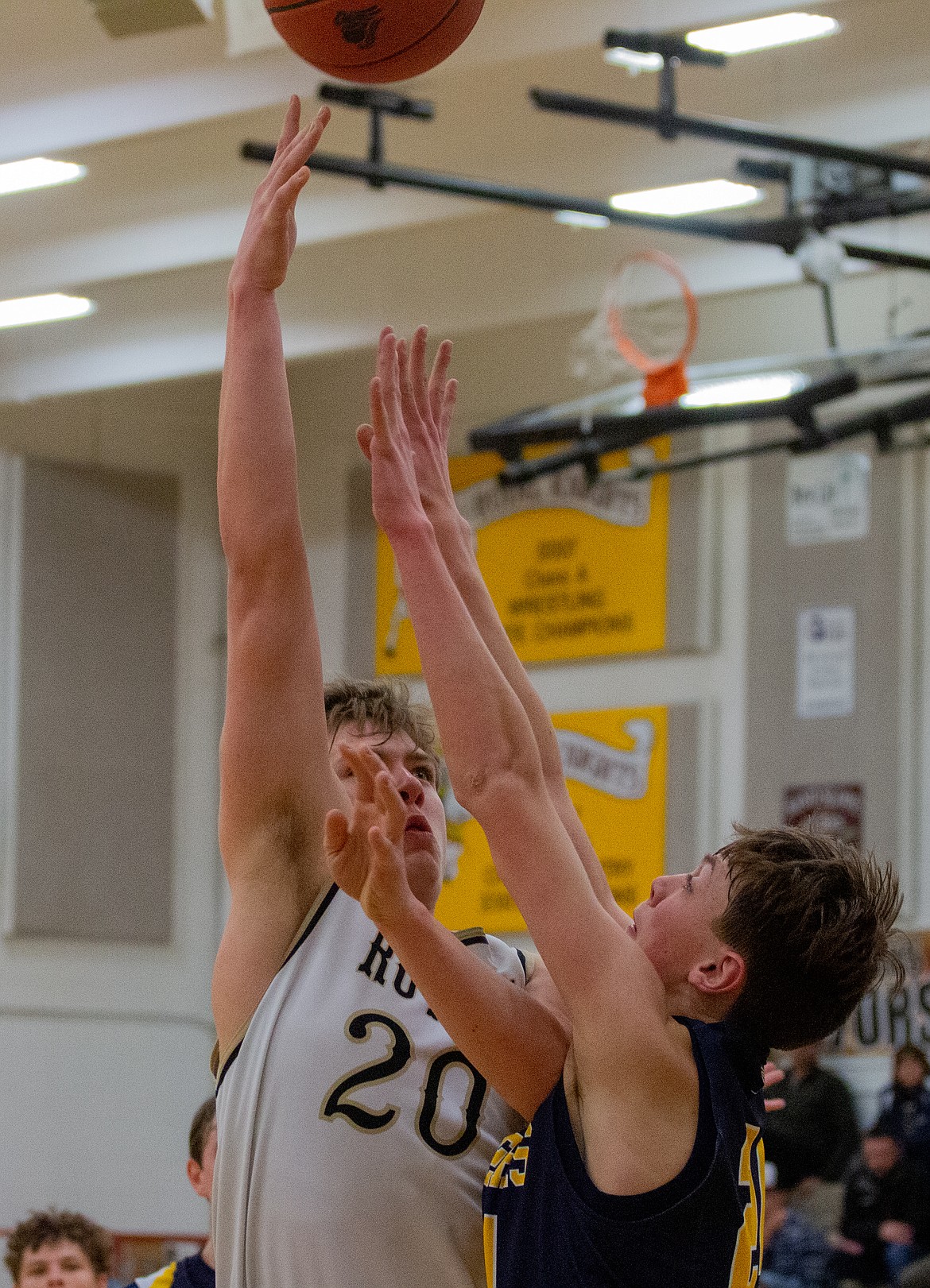 Casey McCarthy/Columbia Basin Herald Caleb Christensen hooks the shot over the defender late in the fourth quarter of the Knights’ 45-41 win over Naches Valley on Tuesday.