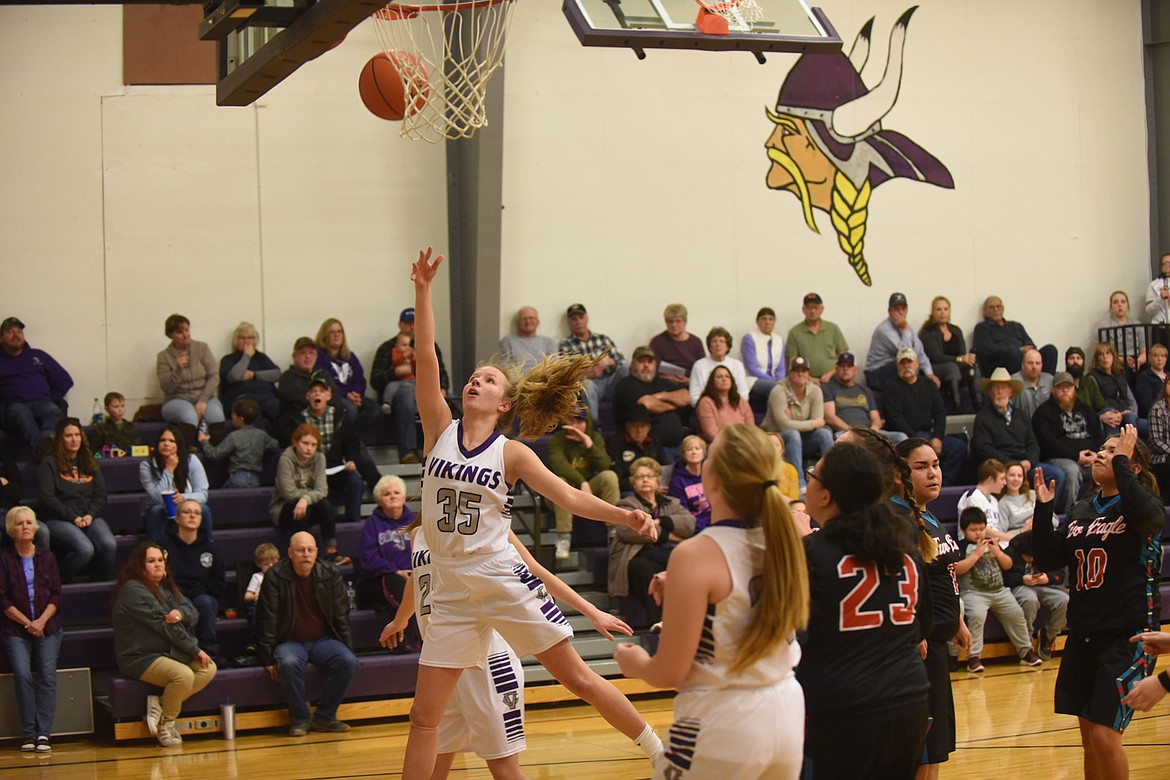 Charlo junior Carlee Fryberger scores two of her 14 points Friday against Two Eagle River. The Lady Vikings won 80-10. (Scott Shindledecker/Lake County Leader)