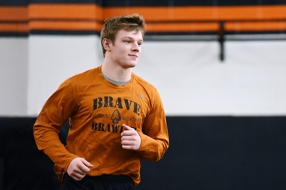 Flathead’s Garett Rieke warms up before practice at Flathead High School on Wednesday, Feb. 12. (Casey Kreider/Daily Inter Lake)