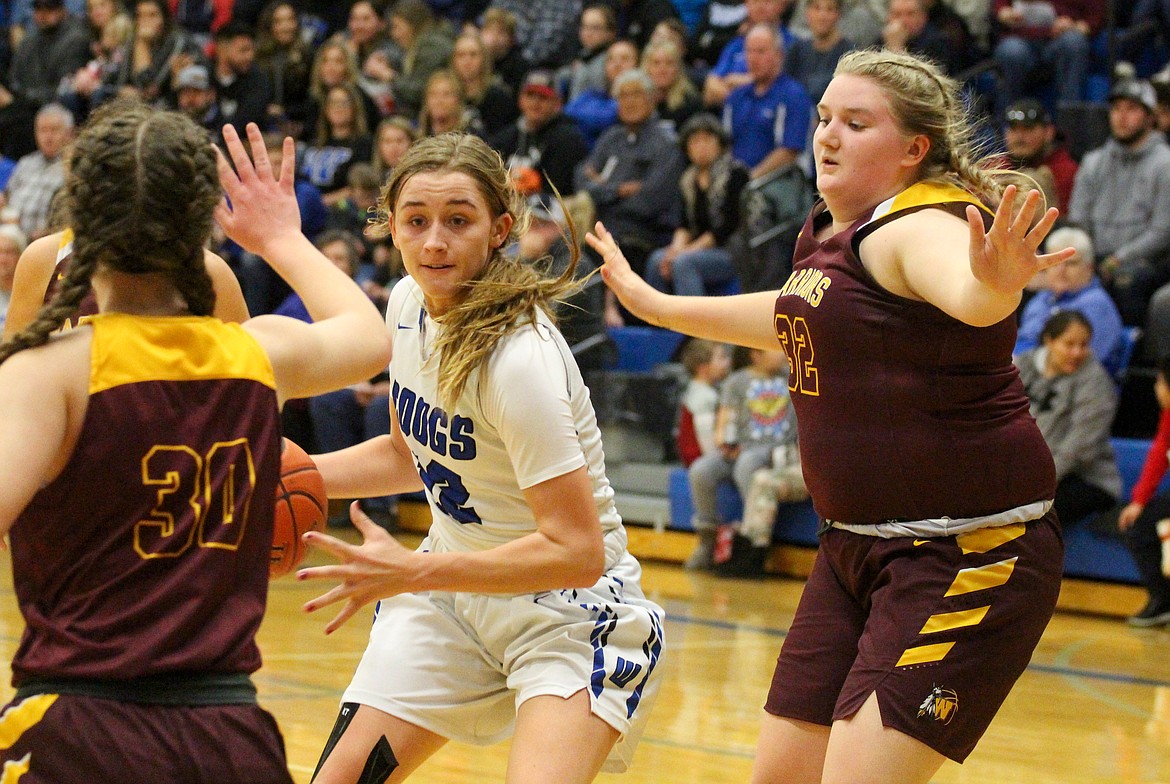 Casey McCarthy/Columbia Basin Herald Senior Brecka Erdmann cuts into the lane before stepping back for the floater in the fourth quarter of Warden’s 64-32 win to open up its postseason.