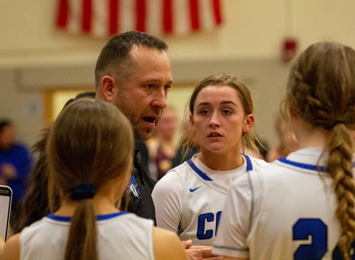 Casey McCarthy/Columbia Basin Herald Warden head coach Josh Madsen talks with his team during a timeout in the second half of the Cougars’ win over Cle Elum/Roslyn on Thursday.