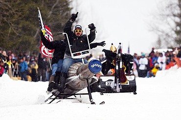 Participants race down Sugar Hill during the Barstool Ski Races at Cabin Fever Days in Martin City on Saturday, Feb. 15. (Casey Kreider/Daily Inter Lake)