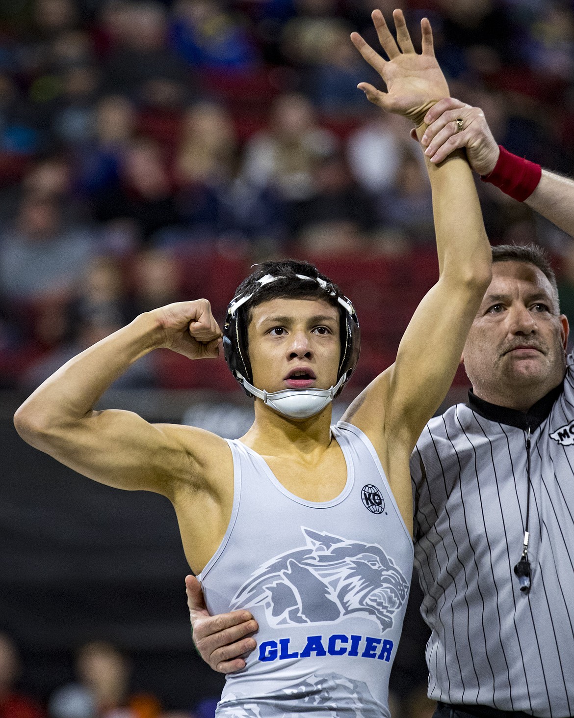 Teegan Vasquez of Glacier wins the Class AA 113-pound championship match during the state wrestling tournament at First Interstate Arena in Billings on Saturday. (Mike Clark/Billings Gazette)