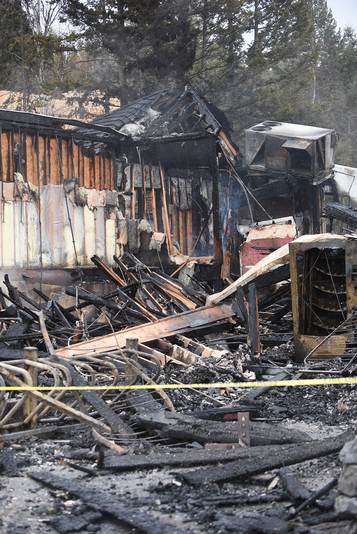 Mostly charred remains are all that was left after a fire destroyed the Eagle Bend Golf Club in Bigfork early Sunday morning. (Scott Shindledecker/Daily Inter Lake)