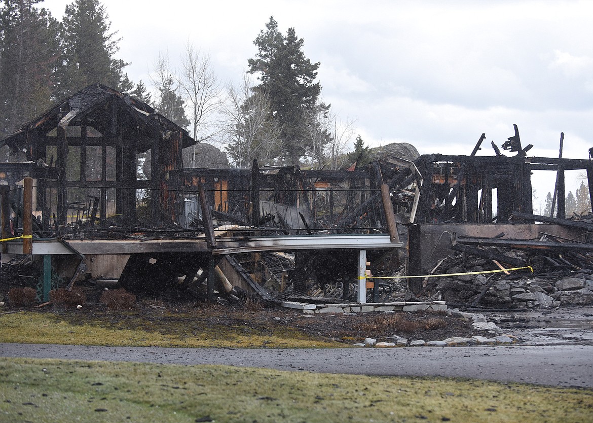 Mostly charred remains are all that was left after a fire destroyed the clubhouse at Eagle Bend Golf Club in Bigfork early Sunday morning. (Scott Shindledecker/Daily Inter Lake)
