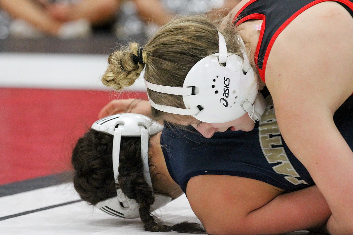 Casey McCarthy/Columbia Basin Herald Othello’s Alexis Monday picked up the win over Mead’s Kelsey Loeun  in the third place match at 110 to secure her spot in the Tacoma Dome at the Mat Classic.