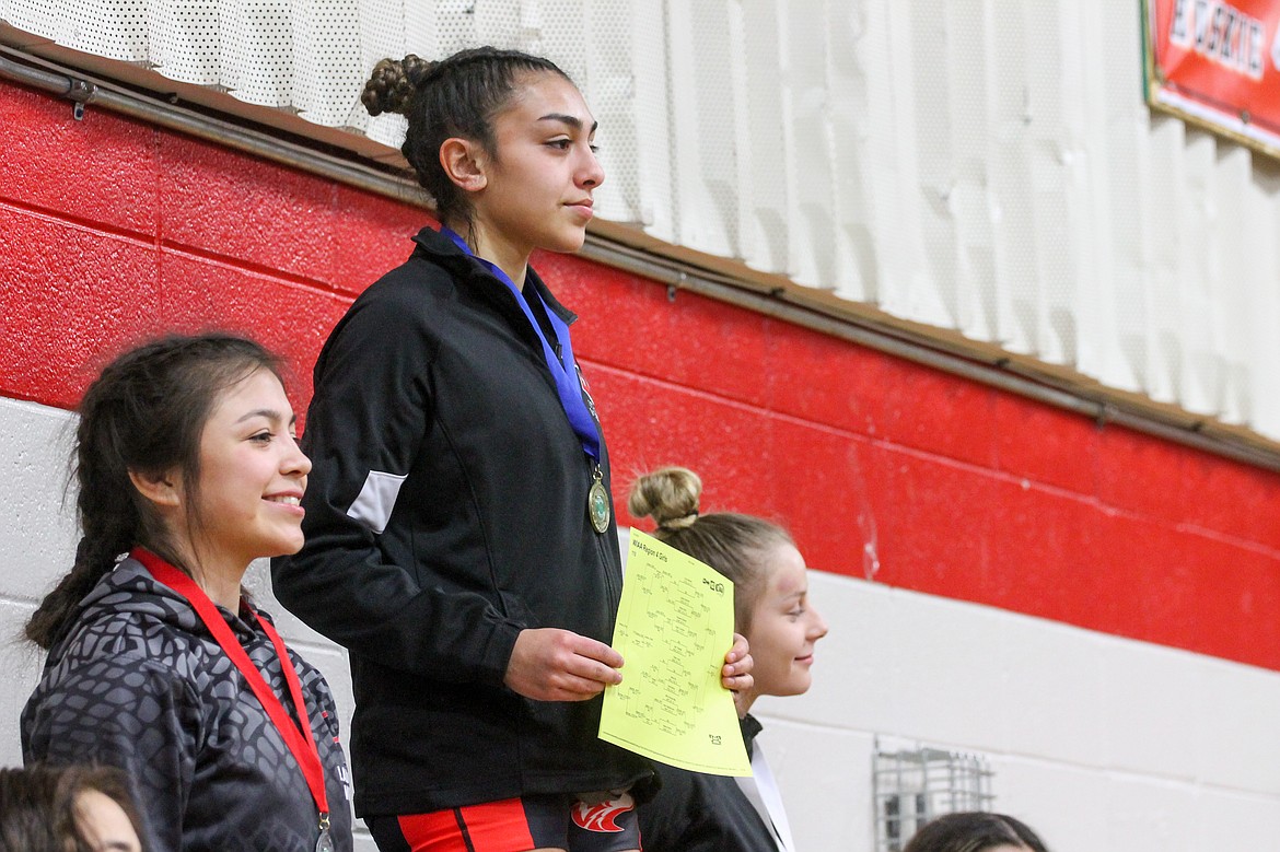 Casey McCarthy/Columbia Basin Herald Othello senior Emily Mendez makes her way back to the Mat Classic after taking the first-place spot at 110 on Saturday.