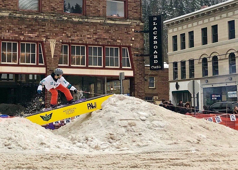 Ben Dick, 26, of Butte, Mont., grinds the first rail on the SkiJor track during the 1 p.m. runs. Dick ended up walking away with the Best Snowboarder award and unique Pabst Blue Ribbon themed snowboard.