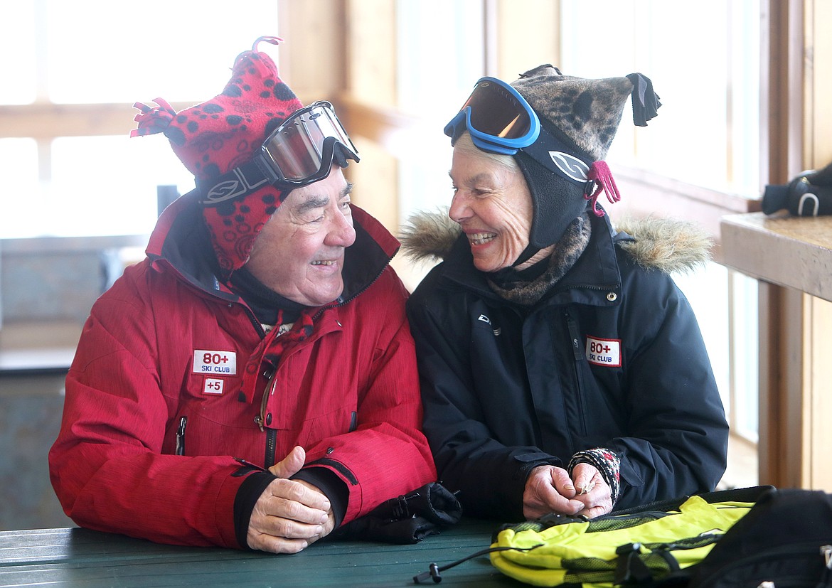 Phil Catalfomo, 88, and Madeline Catalfomo, 84, are pictured during their lunchbreak on Blacktail Mountain. The Catalfomos have been skiing together for years, often standing out in the lodge for their distinguishing fleece hats, handmade by Madeline.