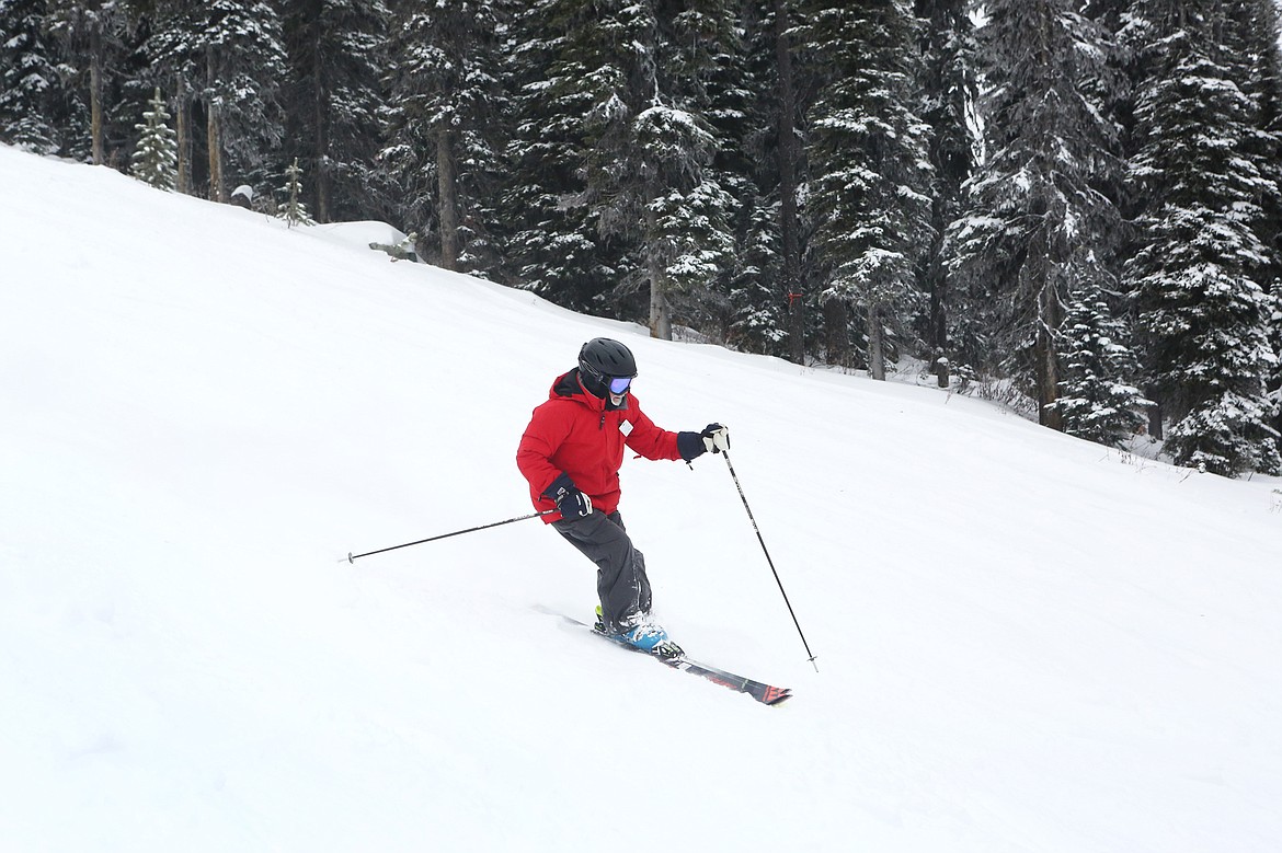 Tom Edge, of Bigfork, skis down Emmons Ridge on Blacktail Mountain the afternoon of Wednesday, Feb. 5. (Mackenzie Reiss/Daily Inter Lake)
