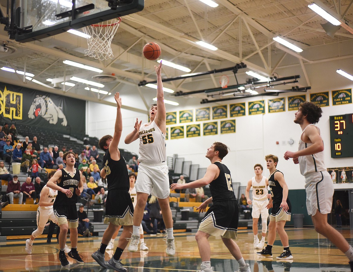 Talon Holmquist tries to end the game in regulation during Friday’s home battle against Stevensville. (Daniel McKay/Whitefish Pilot)