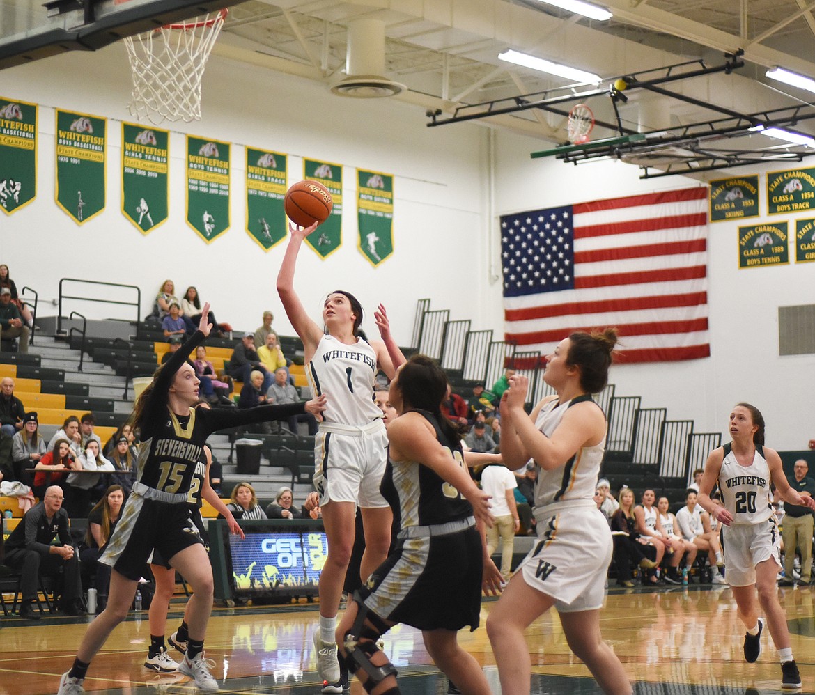 Jadi Walburn floats a shot in Friday’s home win over Stevensville. (Daniel McKay/Whitefish Pilot)