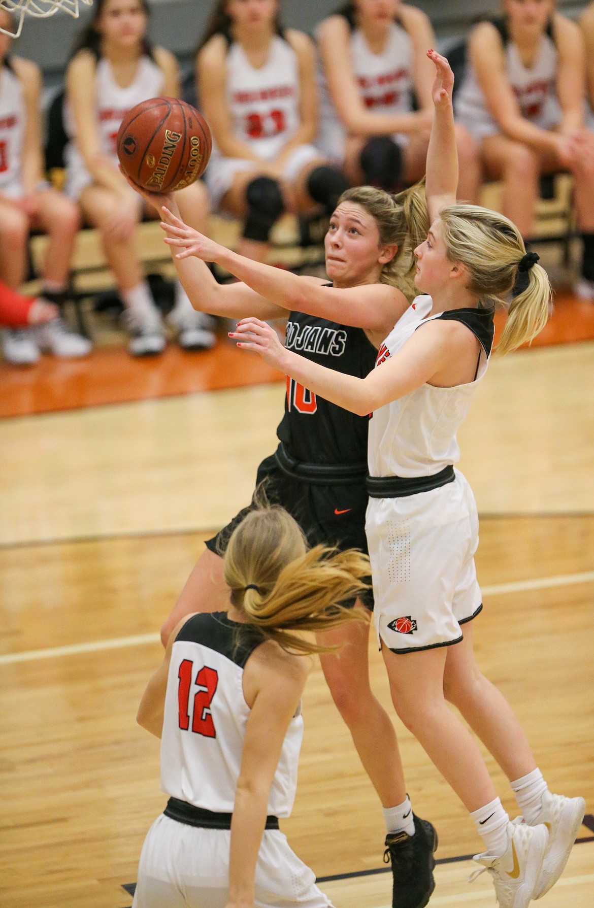 Dylan Lovett of Post Falls goes up for a layup against Boise in the state 5A girls consolation championship game Saturday morning at Ridgevue High in Nampa.