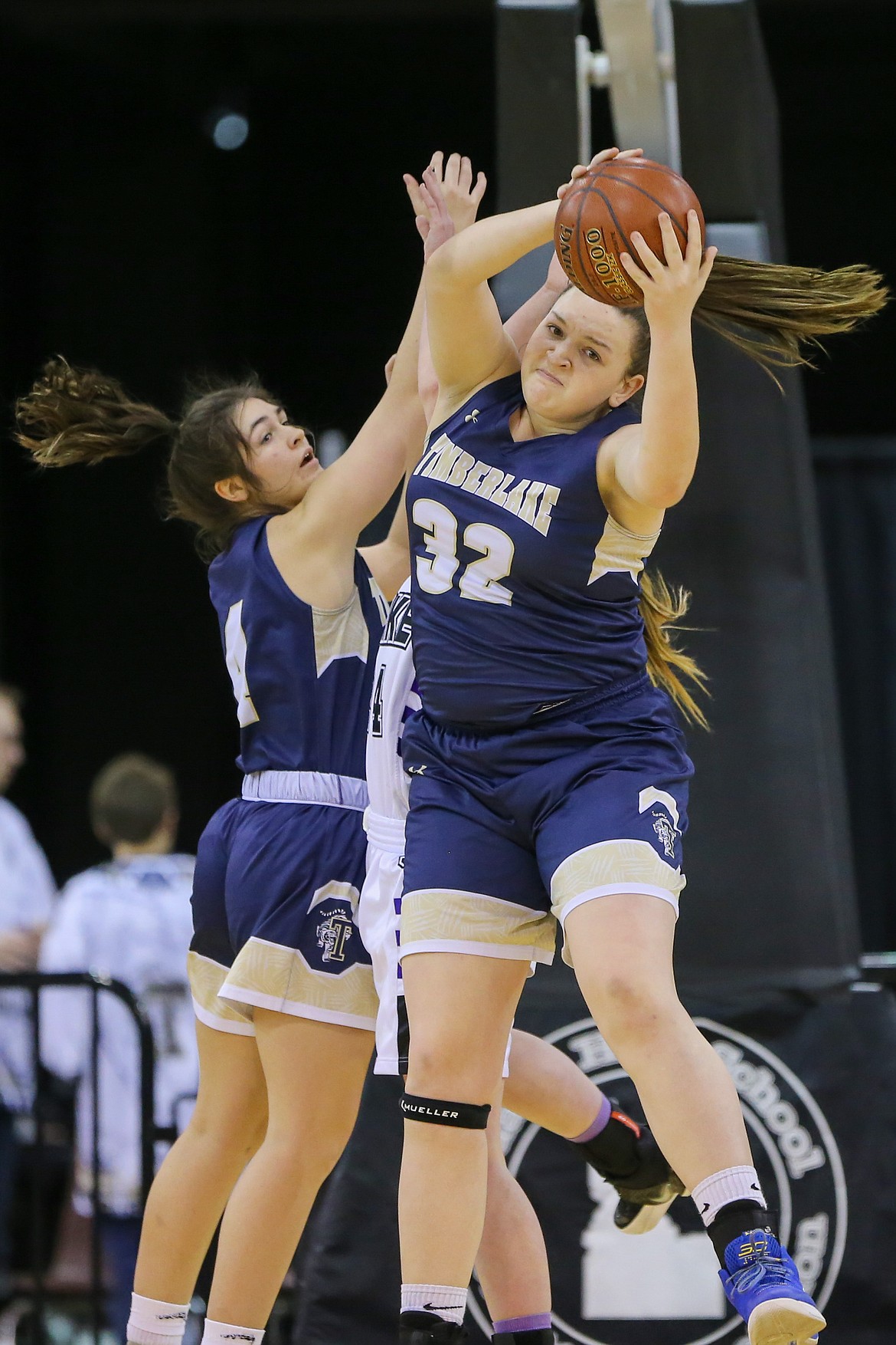 Photo by JASON DUCHOW PHOTOGRAPHY 
 Blayre Jeffs of Timberlake clutches a rebound against Snake River in the state 3A girls championship game Saturday at the Ford Idaho Center in Nampa.