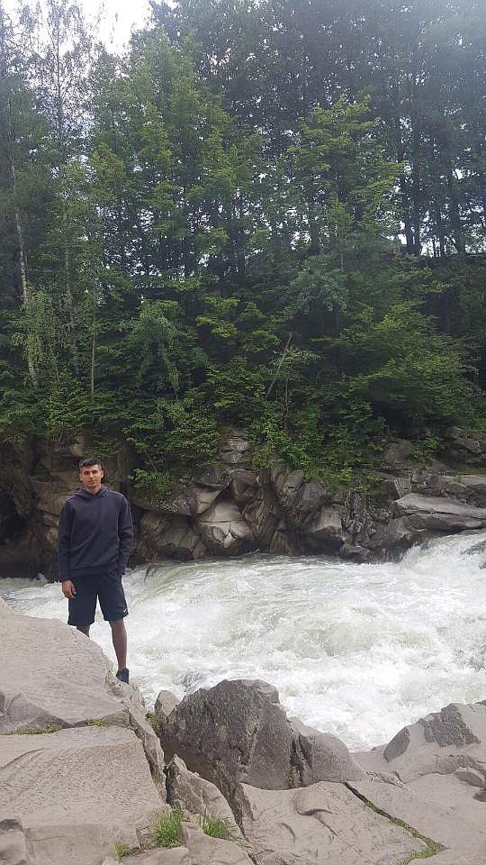 Kuzhel stands next to the raging Prut River near the Ukrainian city of Chernivtsi.