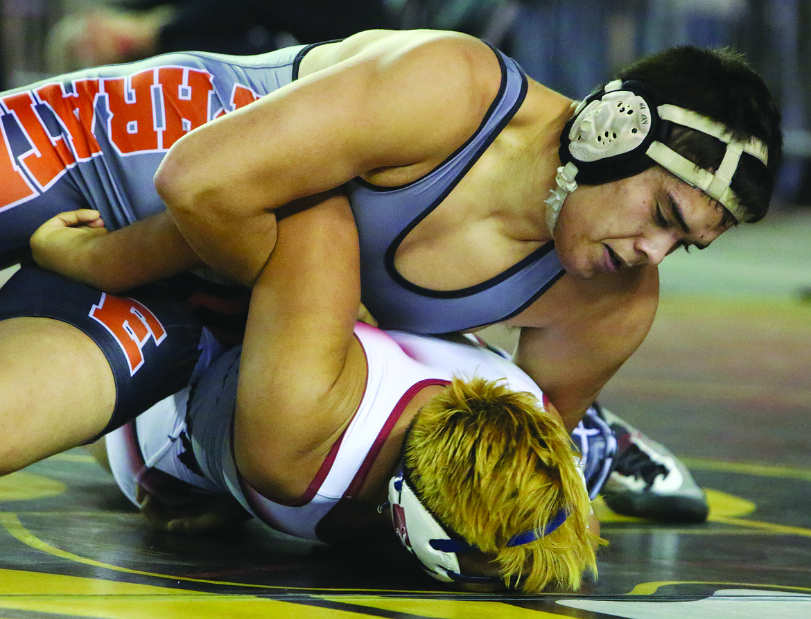 Connor Vanderweyst/Columbia Basin Herald 
 Ephrata's Kevin Pelayo looks to pin his opponent during a consolation round at Mat Classic XXXII.