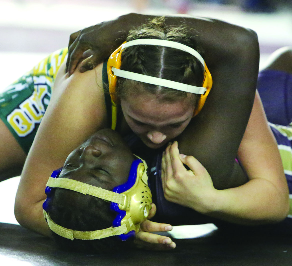 Connor Vanderweyst/Columbia Basin Herald 
 Quincy's Shannon Workinger pins Oak Harbor's Maria Dailey during the 155-pound state semifinals.