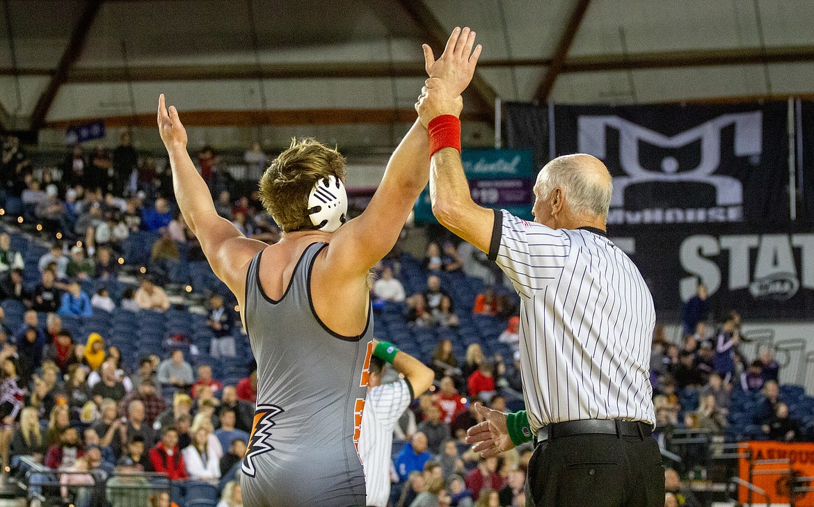 Casey McCarthy/Columbia Basin Herald Mac Laird of Ephrata holds both arms high in celebration after claiming the state championship he's been inching closer to each season.