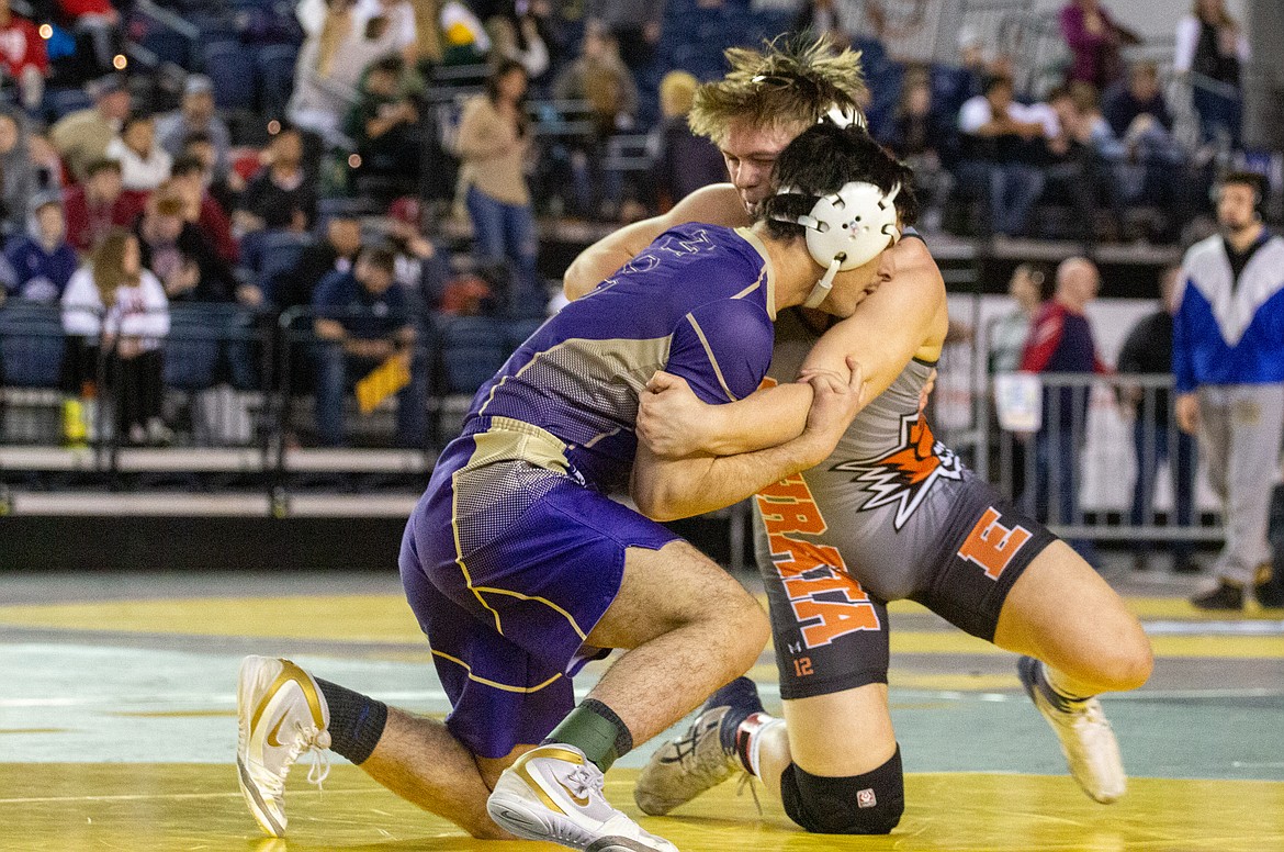 Casey McCarthy/Columbia Basin Herald Ephrata's Mac Laird works to overpower his opponent in the finals matchup at 195 in 2A on Saturday.