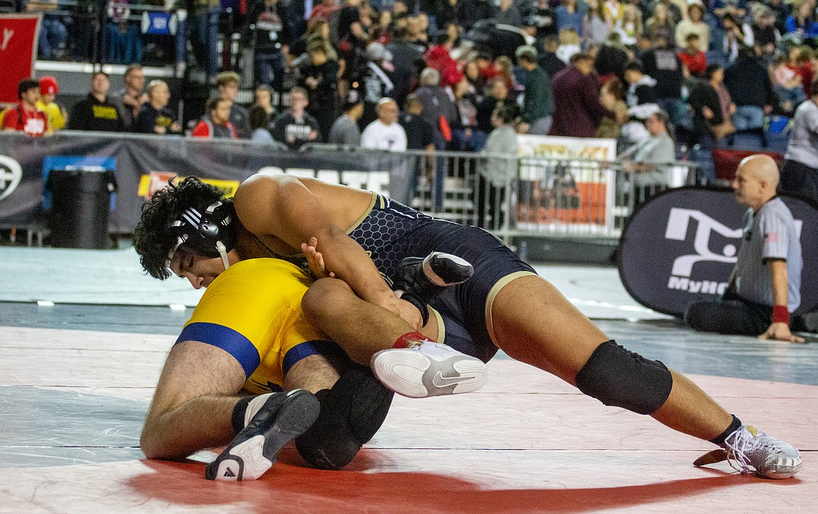 Casey McCarthy/Columbia Basin Herald Royal's Benji Bustos grabbed the fourth-place finish at 170 in 1A, falling to Forks' Hayden Baker in the third-place match.