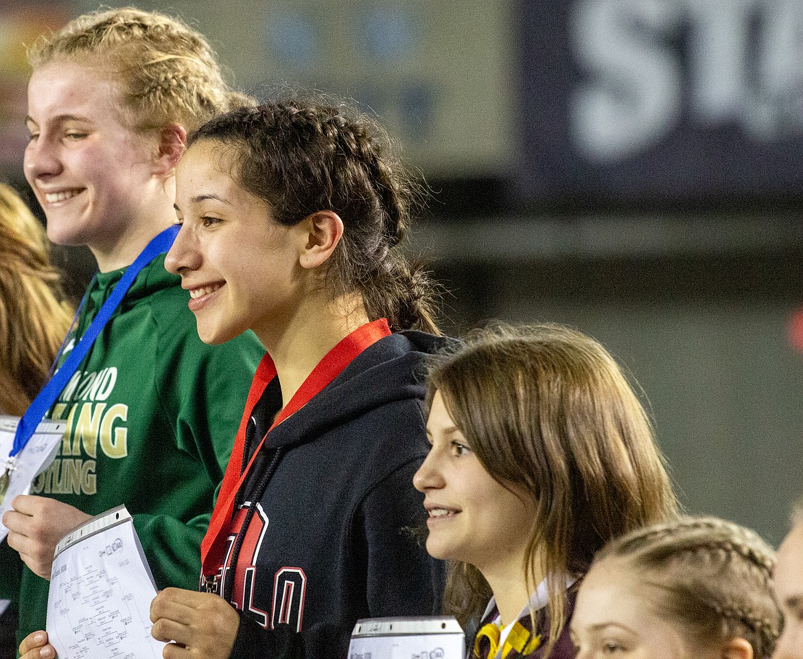 Casey McCarthy/Columbia Basin Herald Othello's Iyazely Barraza (second from left) and Moses Lake's Bianca Johnson (right) both found the podium on Saturday in Tacoma in the 115 pound division.