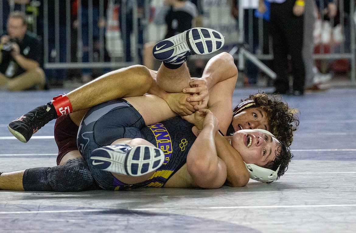 Casey McCarthy/Columbia Basin Herald Moses Lake's Maximus Zamora defeated Sumner's Elijah Gandert to grab the third place finish at 145 on Saturday in the Tacoma Dome.