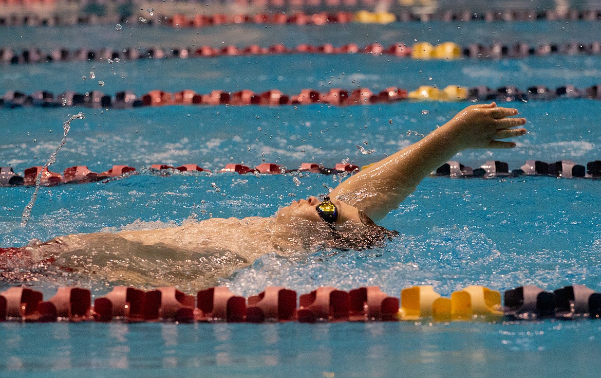 Casey McCarthy/Columbia Basin Herald Moses Lake senior Jared Grant makes his way thorugh the final stretch of the unified 50-yard backstroke finals on Saturday.
