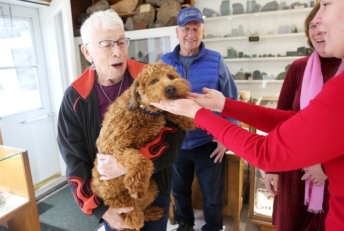 Longtime customer Joan Hodgeboom, of Bigfork, brings her pup in to visit with Kehoe’s Agate Shop staff on Valentine’s Day. Hodgeboom keeps coming back to Kehoe’s because “everybody is knowledgeable — you can ask them any questions you want,” she said. (Mackenzie Reiss/Daily Inter Lake)