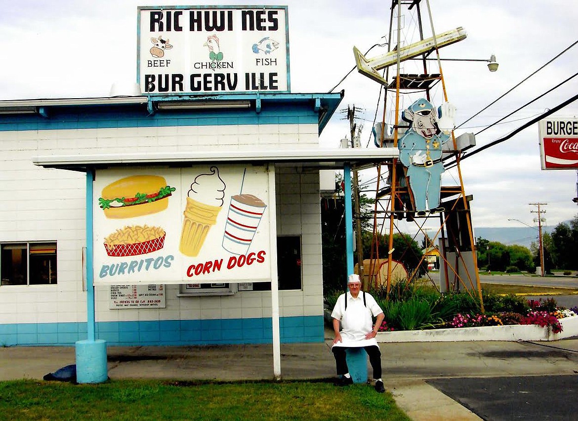 Burgerville’s founder Enoch Richwine in front of the building he put up in the 1960s. (Tom Rollins photo)