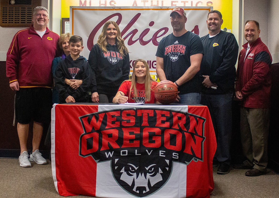 Moses Lake senior Madisyn Clark was joined by coaches, family and friends on Thursday afternoon as she signed to continue her playing career next season at Western Oregon University.